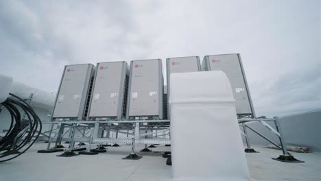 the air conditioning and ventilation system of a large industrial facility is located on the roof. it includes an air conditioner, smoke exhaust, and ventilation.