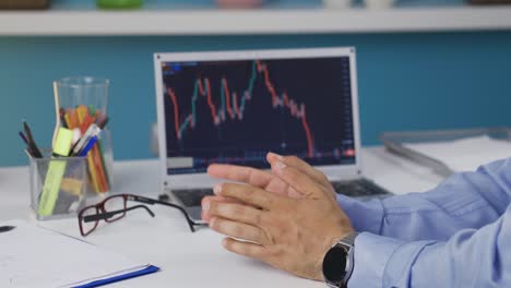 Man-examining-financial-chart-and-investing-is-stressed-and-nervous.