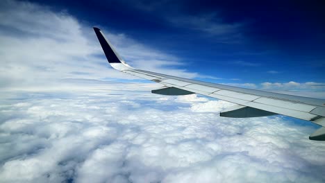 heavenly-cloudy-blue-sky-view-from-commercial-airplane-windows