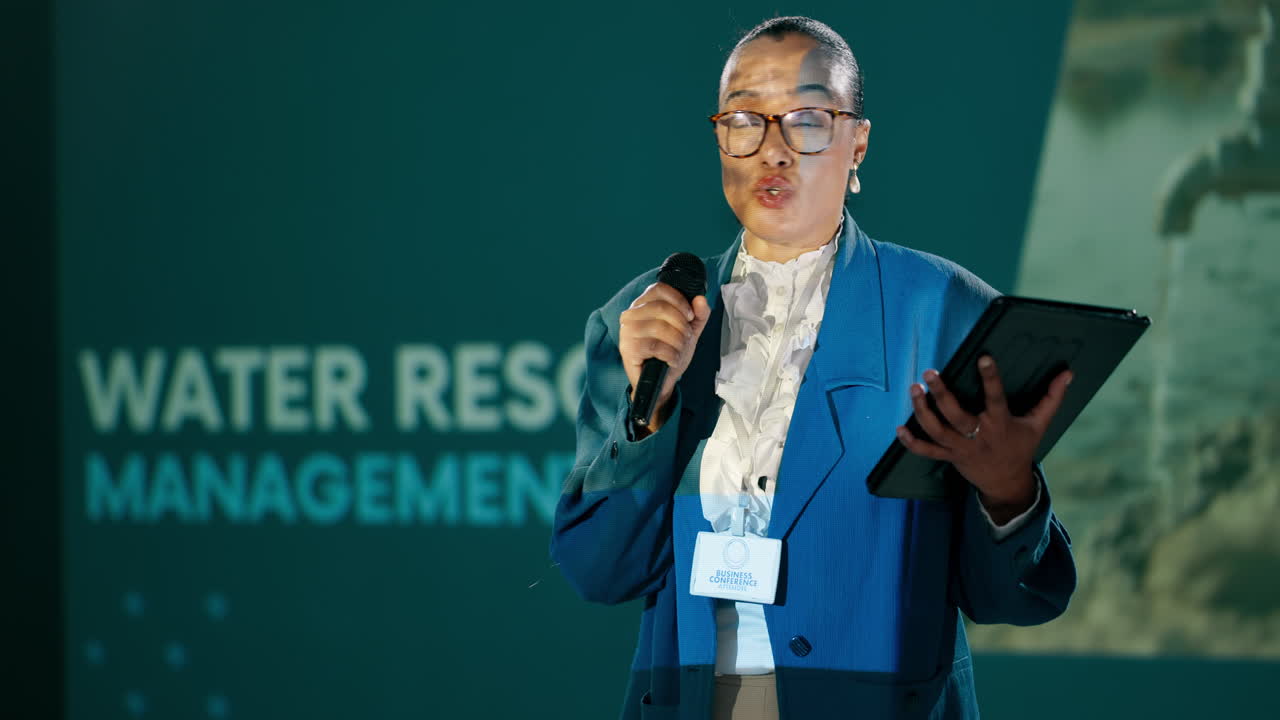 Woman presenting at a water resource management conference