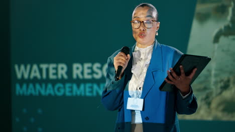 woman presenting at a water resource management conference