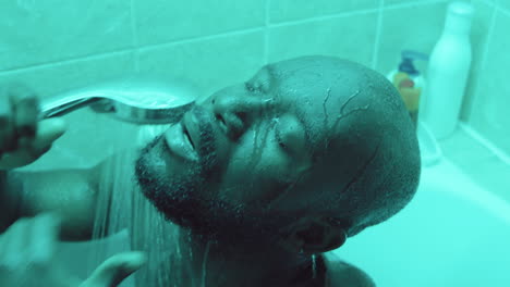 black man taking shower