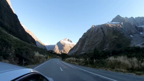 driving through the mountain pass on the way home from milford sound in new zealand