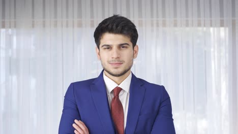 portrait confident man in stylish suit looking at camera.