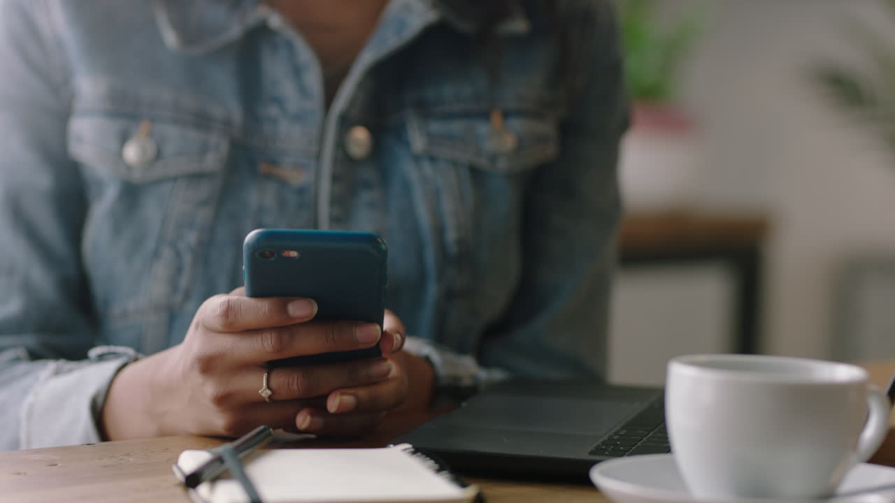 business woman hands using smartphone in cafe texting browsing social media messages sharing sms communication entrepreneur sending email enjoying mobile phone connection close up