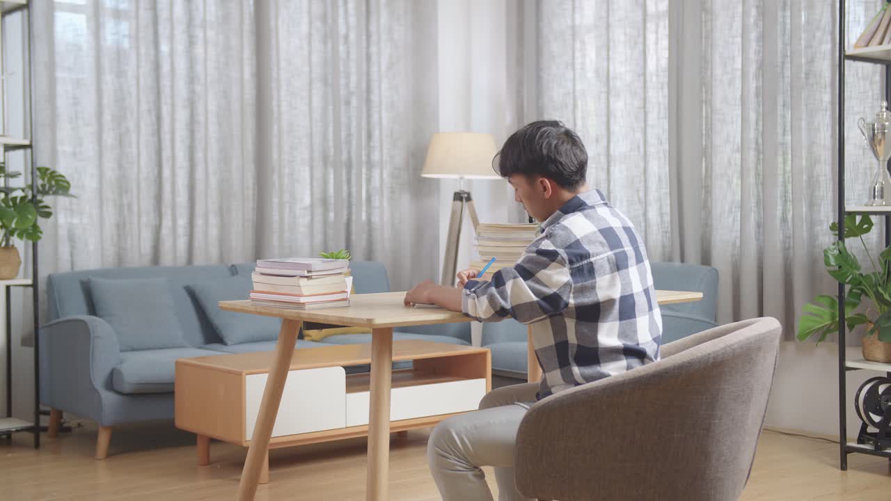 Tired Student Yawning at Desk