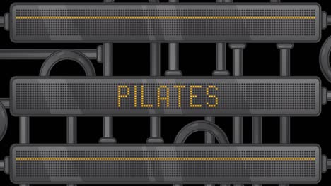 pilates text on a digital led panel.