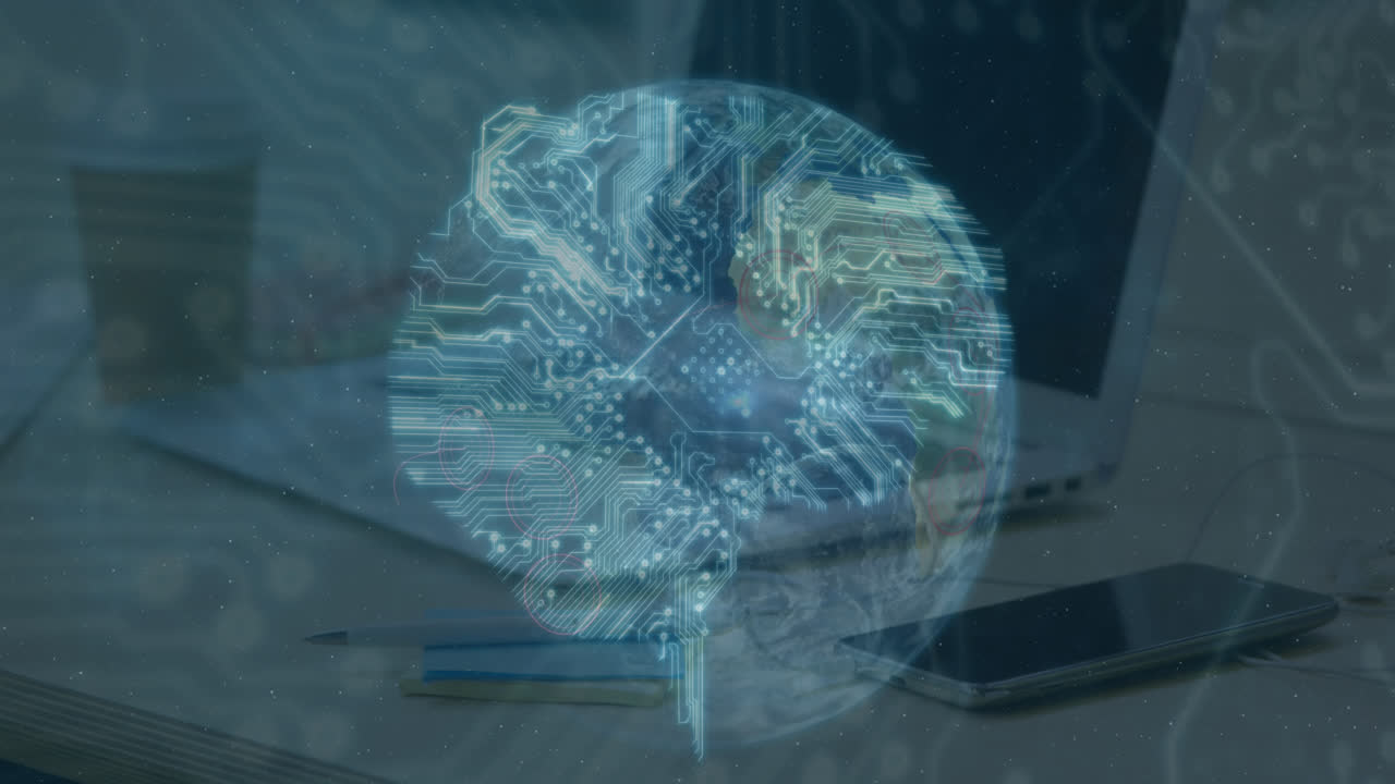 책상 위의 사무실 장비에 대항하여 회전하는 지구를 통해 마이크로프로세서 연결