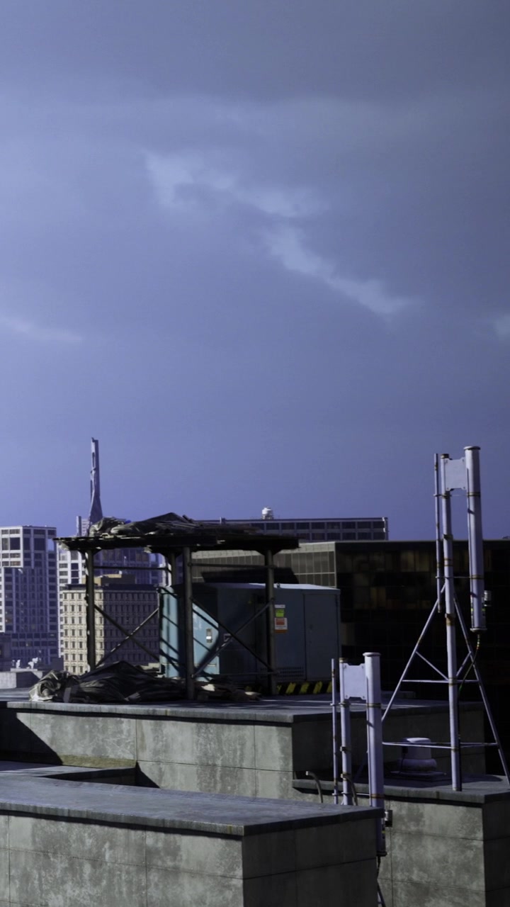 Cloudy skyline view showcasing rooftops and city structures at dusk