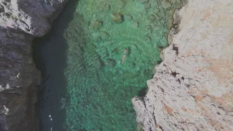 woman dives into water