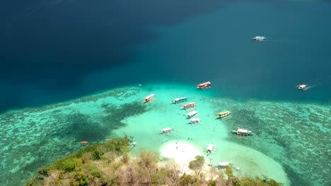 aerial fly over of cyc beach on cyc island, coron town, philippines