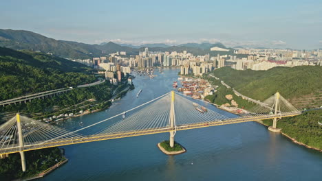 tsuen wan and traffic on ting kau bridge in hong kong on golden hour