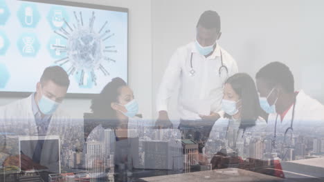 composite of diverse group of male and female doctors in face masks at meeting, and cityscape