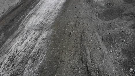 Pan-up-flyover-over-Otemma-glacier-in-Valais,-Switzerland