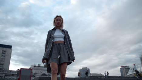 city woman jumping stairs in casual clothes at urban background street view.