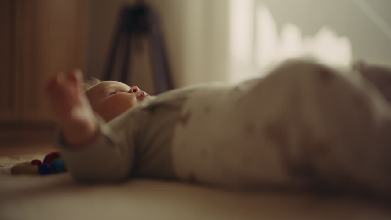 Close-Up of Baby Boy Exploring on Play Mat