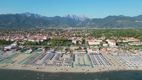 tuscany beach and coastline at summer vacation in forte dei marmi, italy - aerial 4k