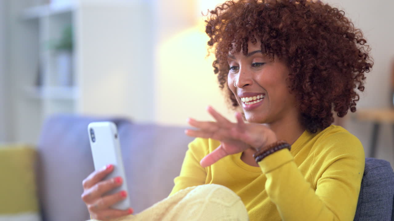 Cheerful woman talking on a video call