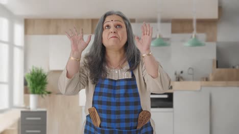 Angry-Indian-aged-housewife-shouting