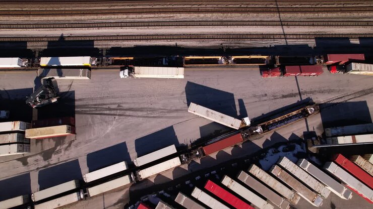 Reach stacker at work in logistic center of Vancouver terminal in Canada