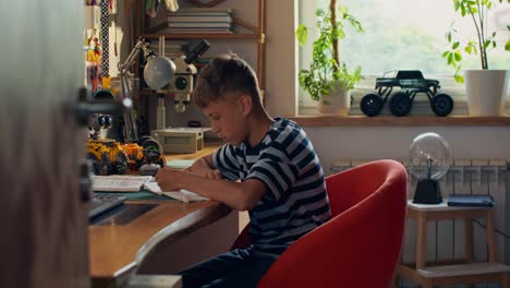 boy studying at home