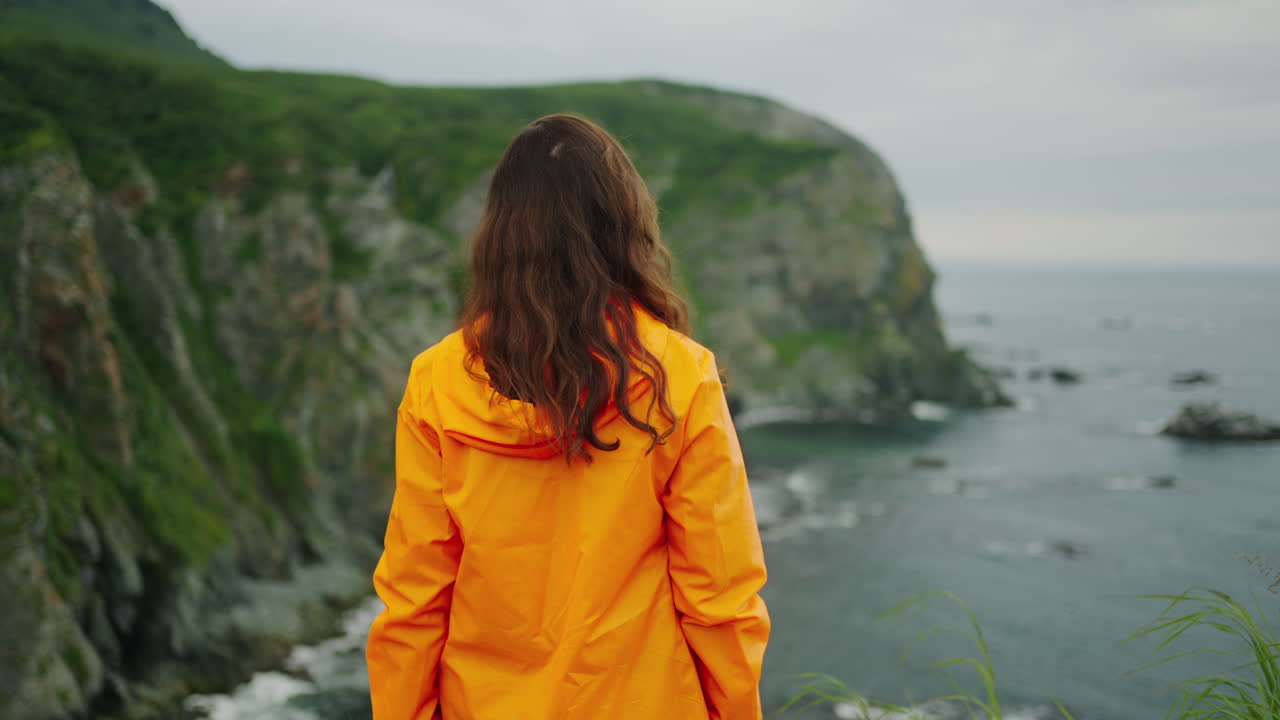 Woman Hiking by the Ocean