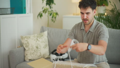 man pulls out vr accessories