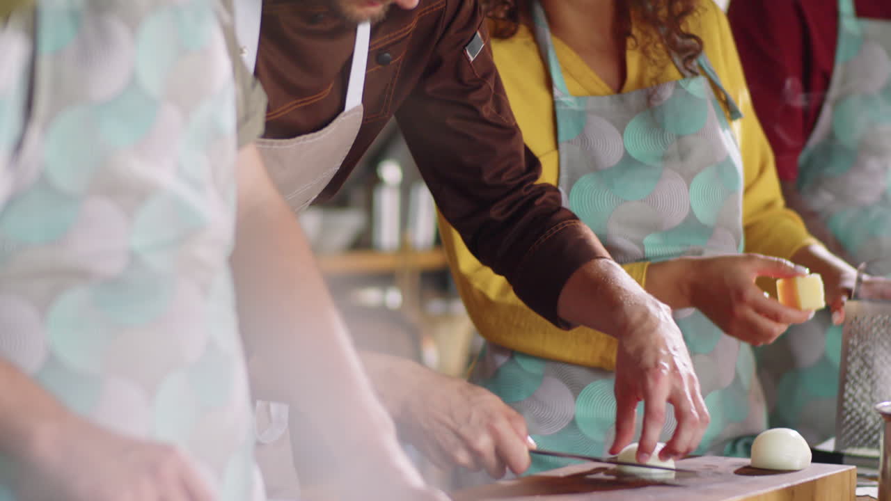 Chef Chopping Onion during Cooking Master Class