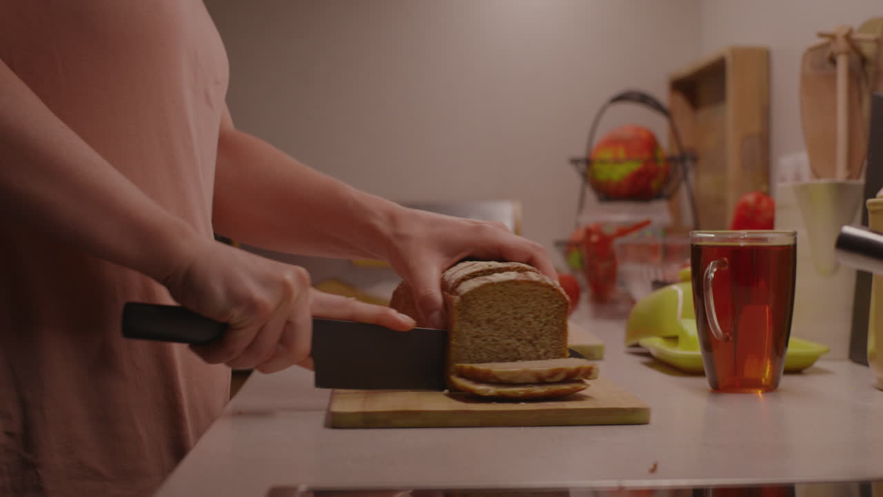 Slicing bread in the kitchen