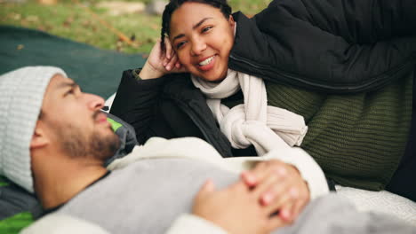 couple talking, happy and in nature for a date