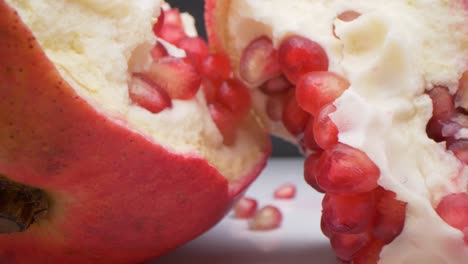 slider view of splitted pomegranate into pieces