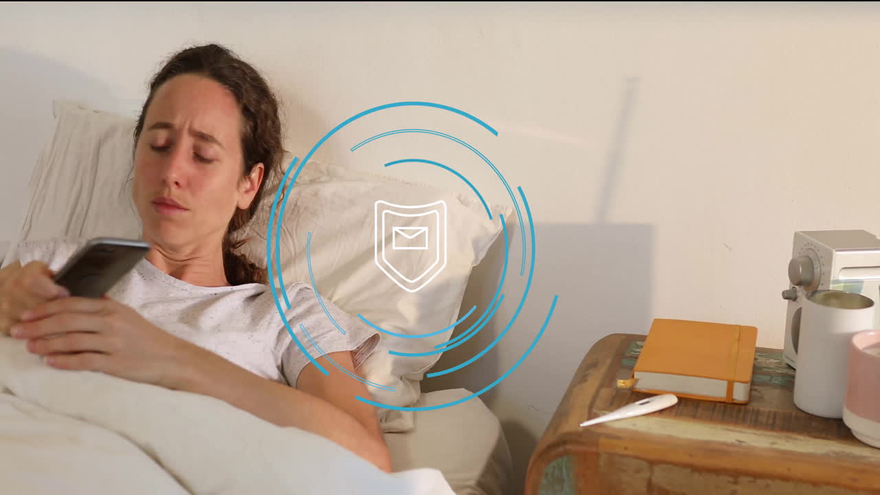 Woman in bed checking phone with email security animation overlay