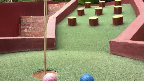 Navigating-Obstacles-to-Reach-the-Green-and-the-Hole-on-the-Mini-Golf-Course