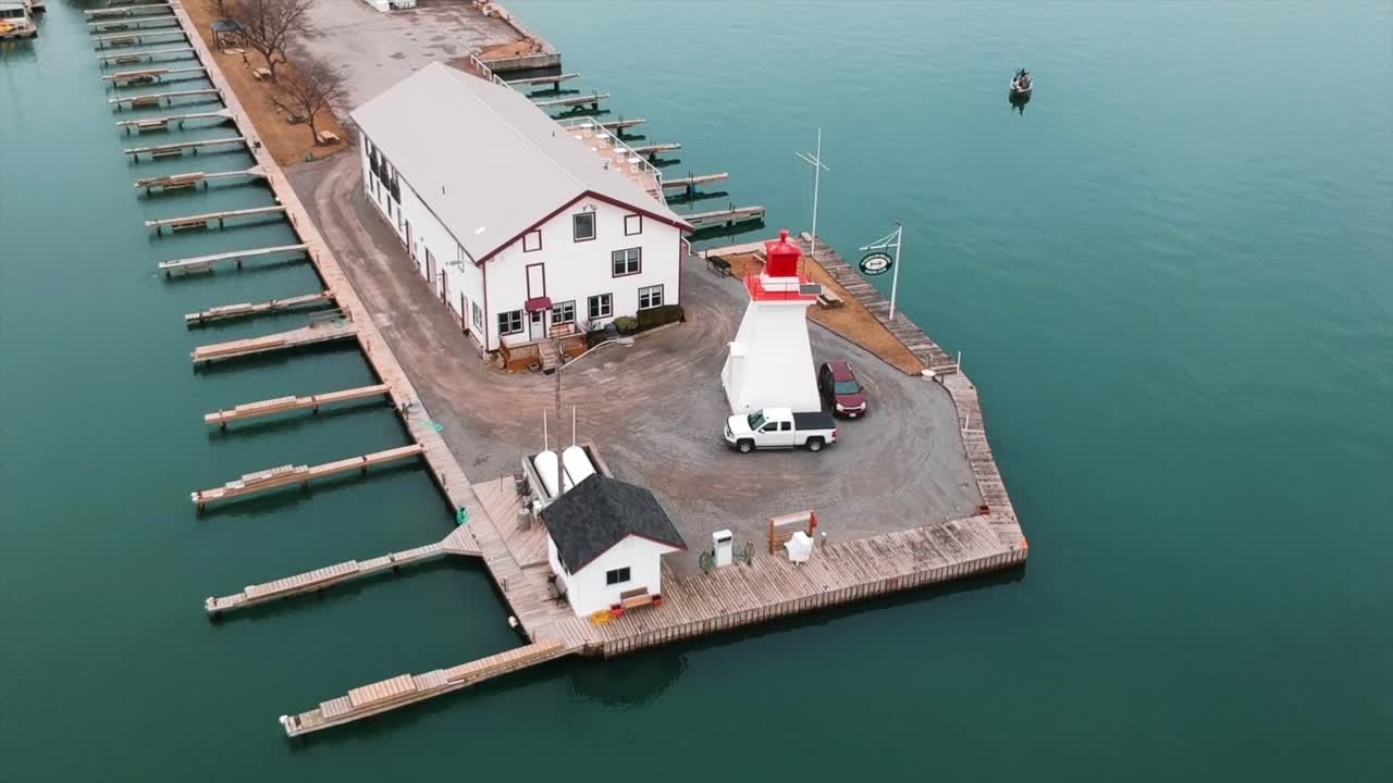 Aerial View of a Lighthouse and Marina