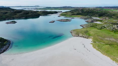 sea reaching the beach on the isle of mull