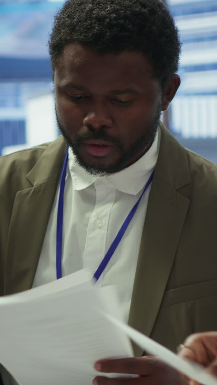 Vertical Video Enterprise manager works with his staff on creating a business strategy