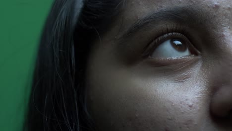 close up of right eye of asian teenager looking up