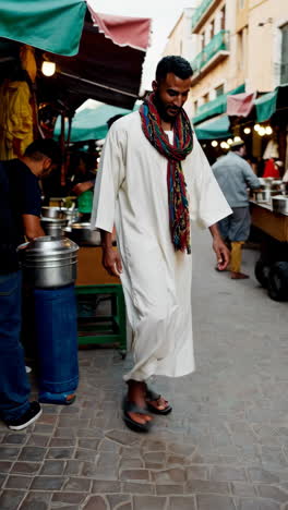 man walking through a vibrant spice market