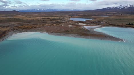 stunning aerial view of lake tekapo with turquoise waters in south island of new zealand.
