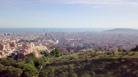 barcelona cityscape aerial shot zooming out vertigo effect at sunset