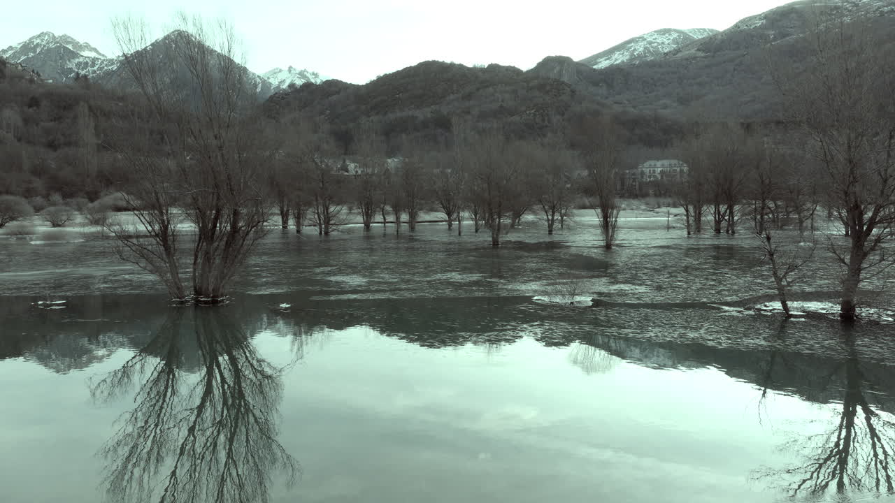 Frozen River Landscape with Mountain Reflection