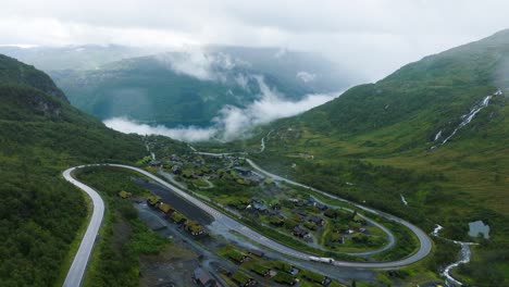 røldal ski center on rainy summer day, drone ascend