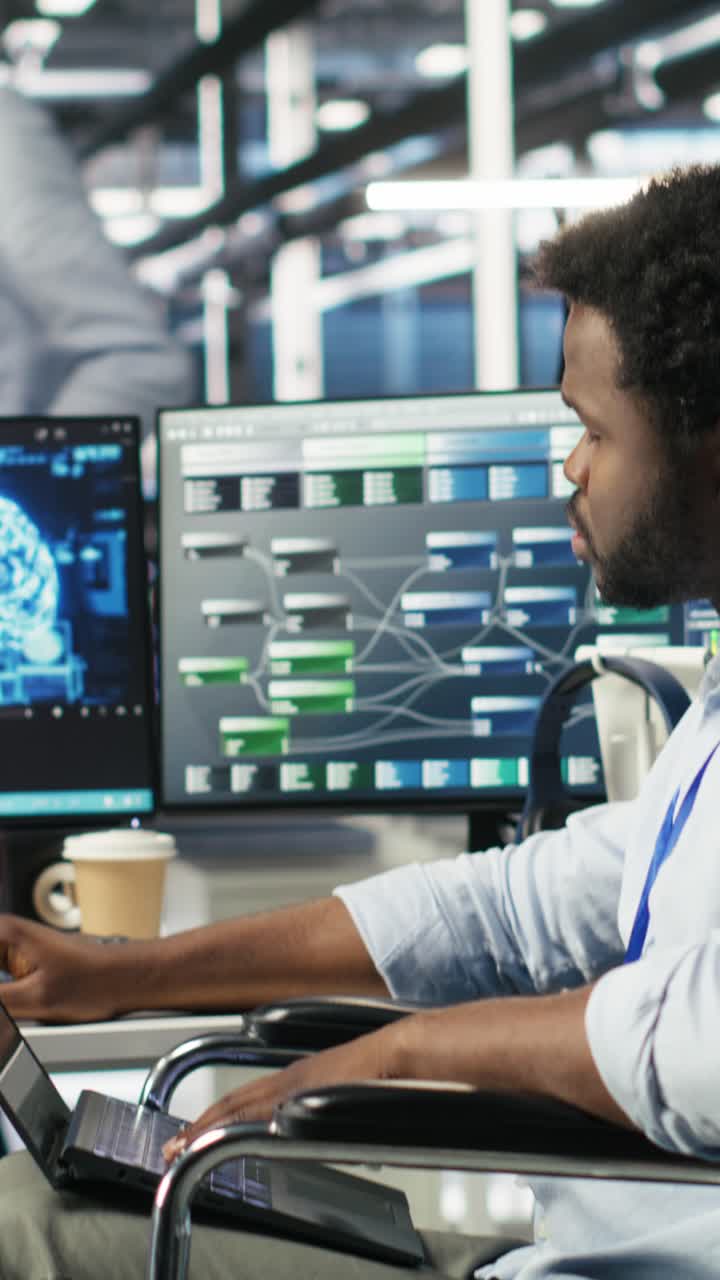 Vertical Video Data Center Computer Scientist In Wheelchair Using Ai Node Tree Software