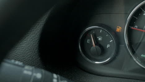 dashboard fuel gauge shows car is on empty