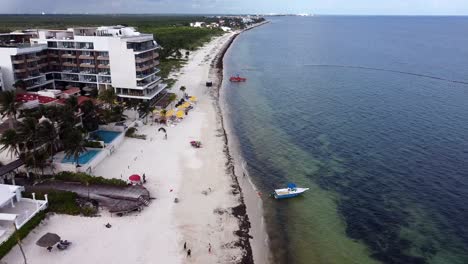 aerial shot of a beach town in mexico overcast day