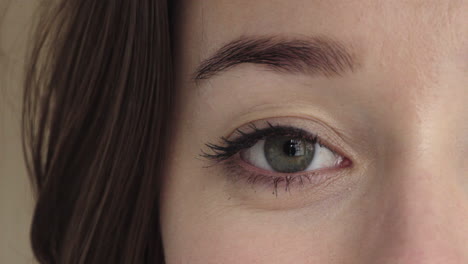 close-up-caucasian-woman-eye-blinking-looking-at-camera-happy-eyesight-optical-health-concept
