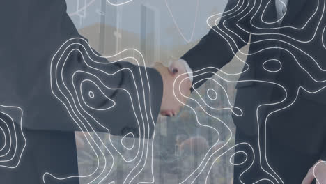 animation of moving shapes over caucasian business people shaking hands