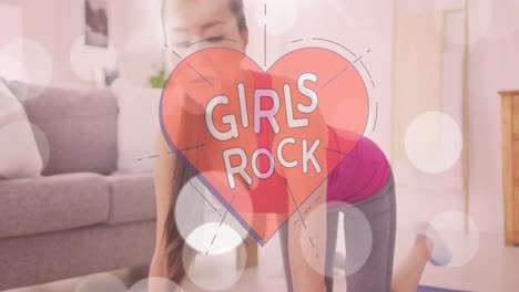 Animation-of-heart-with-girls-power-text-over-biracial-woman-practicing-yoga