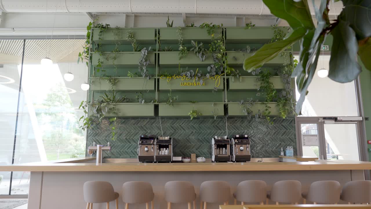 Slow revealing shot of a tea and coffee station within a company office