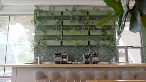 slow revealing shot of a tea and coffee station within a company office